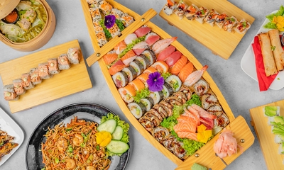 Sushibox + loempia's (2 pers.) of 2-gangendiner (2 pers.) in hartje Genk