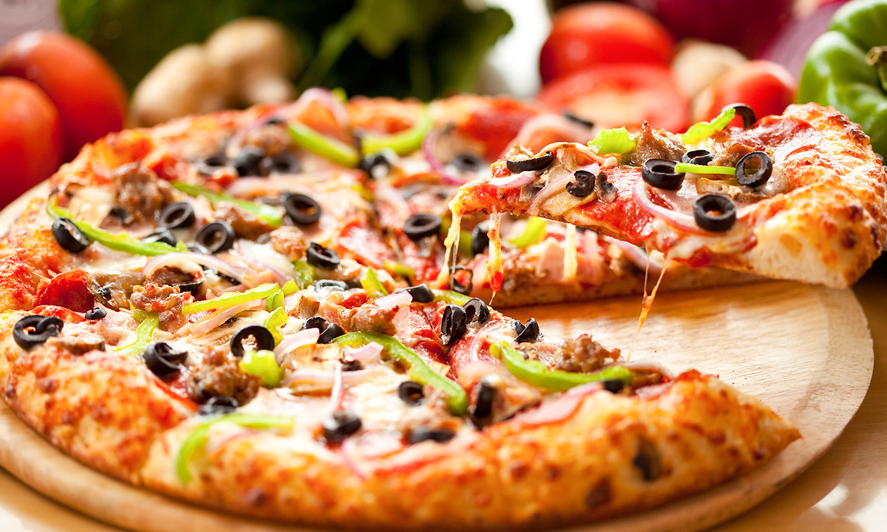 Medium pizza + drankje naar keuze