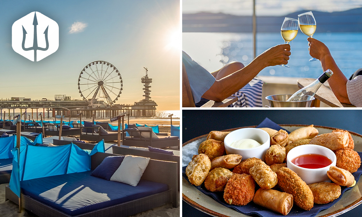 Luxe strandbed + fles wijn + bittergarnituur op het strand van Scheveningen